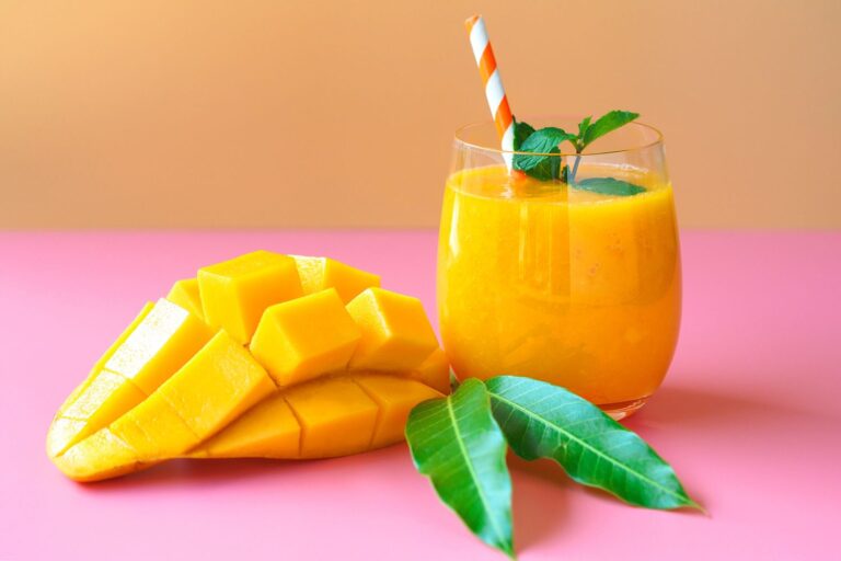 health-benefits-of-mango-juice-GettyImages-1147373774-f7ebf4e4c13f4f67a2420df3c4325a04.jpg