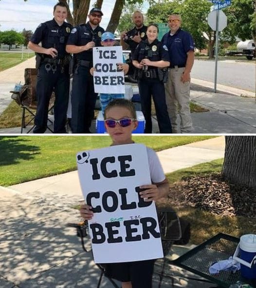 ht1-police-are-called-on-boy-selling-ice-cold-beer-but-then-they-get-a-closer-look-at-his-sign-k2md2dkl (1)